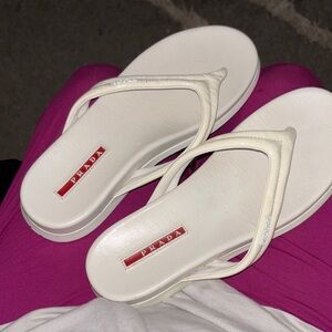 Prada White Leather Flip Flop Sandals with Red Logo